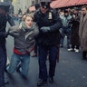 New York City police officers dragging a protester during an abortion-rights demonstration in front of New York's St. Patrick's Cathedral, Dec. 10, 1989. About a thousand people voiced their opinion against the Catholic church's stand on abortion and AIDS.