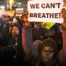 Demonstrators participating in a rally against a grand jury's decision not to indict the police officer involved in the death of Eric Garner, Thursday, Dec. 4, 2014, in New York. A grand jury cleared a white New York City police officer Wednesday in the chokehold death of Garner, an unarmed black man, who had been stopped on suspicion of selling loose, untaxed cigarettes.