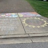 While taking my morning walk, I notices the following picture painted on a resident’s driveway in Ft Washington Md
