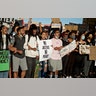 Demonstrators hold signs and shout during a protest over the death of George Floyd, who died May 25 after being restrained by police in Minneapolis, on June 5, 2020 in Portland, Ore.
