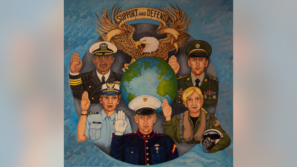 Mural in American Legion Post 35 highlighting the diversity of the US military operation.