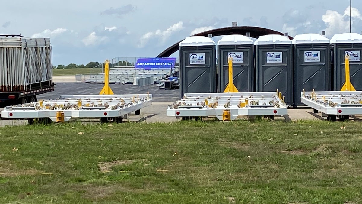 A long range view on Friday of the Trump campaign's site for Saturday night's rally with the president at Portsmouth International Airport in New Hampshire. The rally has been postponed due to severe weather concerns.