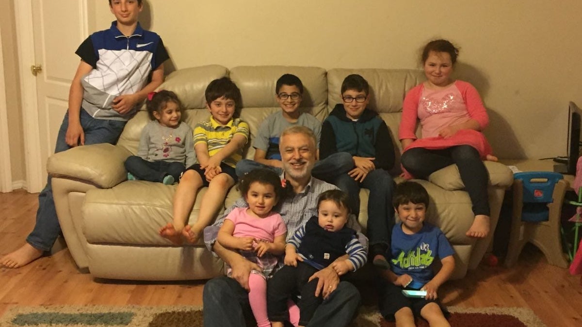 Happier times: Majd Kamalmaz with his grandchildren in the U.S.