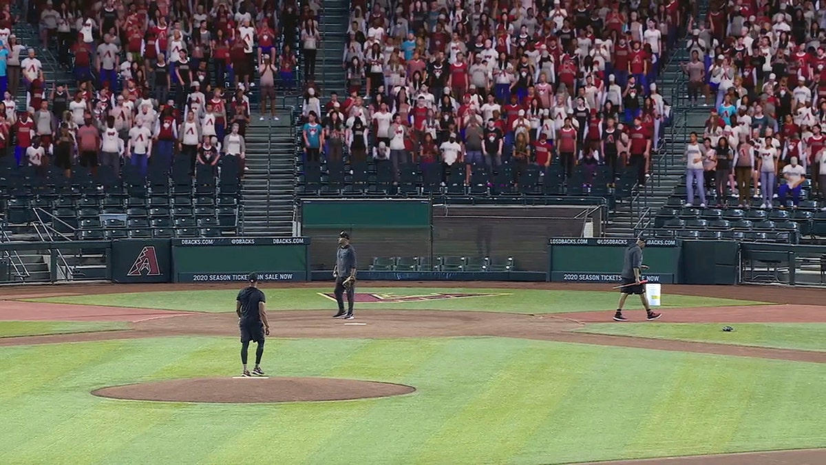This image provided by Fox Sports shows a screen shot from video showing a test of the virtual crowds at Chase Field in Phoenix, in early July 2020. Fox Sports has revealed that it will include computer-generated fans beginning with their three Major League Baseball games on Saturday, July 25. (Fox Sports via AP)