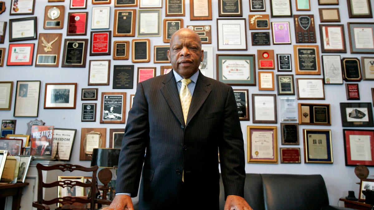 In this Thursday, May 10, 2007 file photo, U.S. Rep. John Lewis, R-Ga., in his office on Capitol Hill, in Washington. Lewis, who carried the struggle against racial discrimination from Southern battlegrounds of the 1960s to the halls of Congress, died Friday, July 17, 2020.