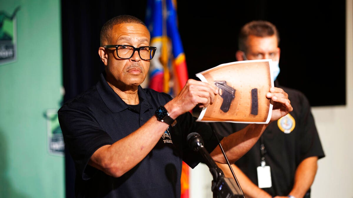 Detroit Police Chief James Craig shows a photograph of the handgun used by a Hakeem Littleton, who shot at police officers at close range while they were arresting his friend in Detroit. Officers returned fire and killed Littleton.