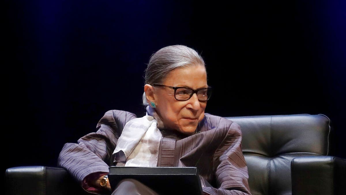 FILE - In this Oct. 21, 2019, file photo U.S. Supreme Court Justice Ruth Bader Ginsburg listens to speakers during the inaugural Herma Hill Kay Memorial Lecture at the University of California at Berkeley in Berkeley, Calif. At 87, Ginsburg is the oldest member of the court. Her next oldest colleagues are 81-year-old Stephen Breyer, 72-year-old Clarence Thomas and 70-year-old Samuel Alito. (AP Photo/Jeff Chiu, File)