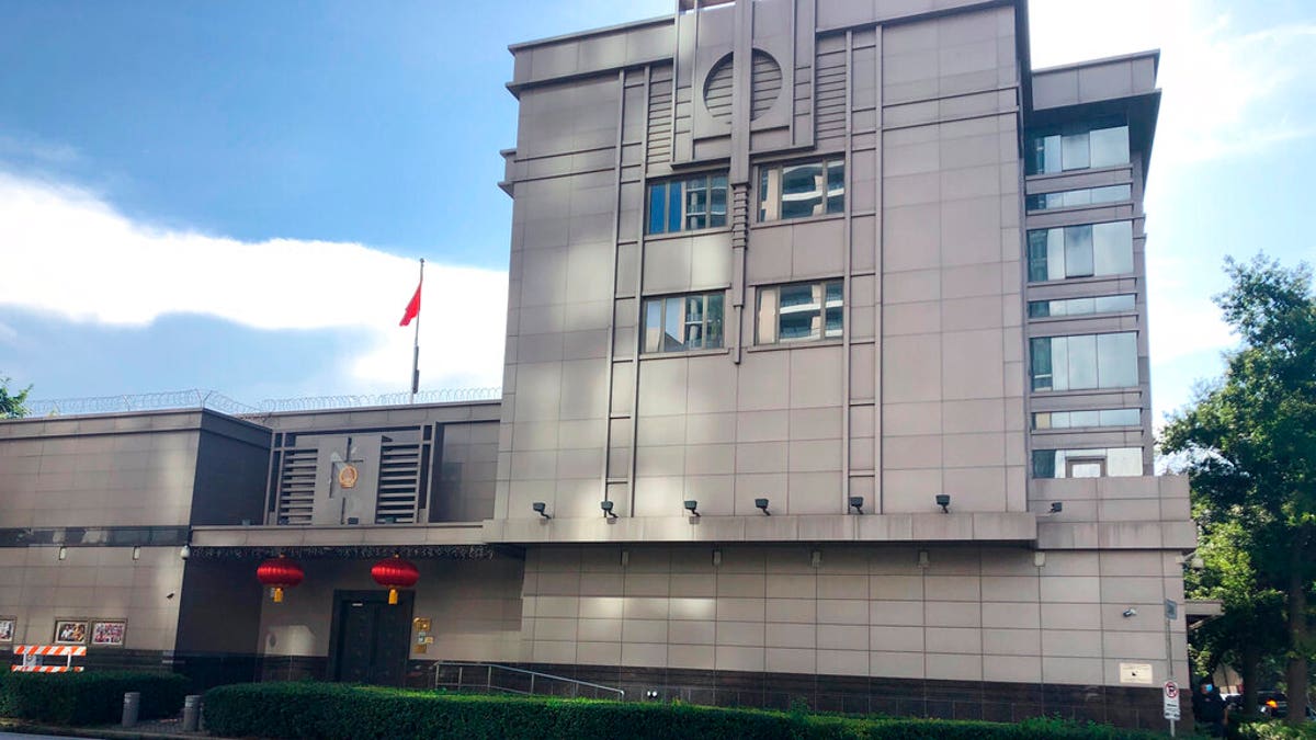 The Chinese Consulate General in Houston. Police and fire officials there responded to reports that documents were being burned in the courtyard of the consulate Tuesday night, according to the Houston Police Department. (AP Photo/John Mone)