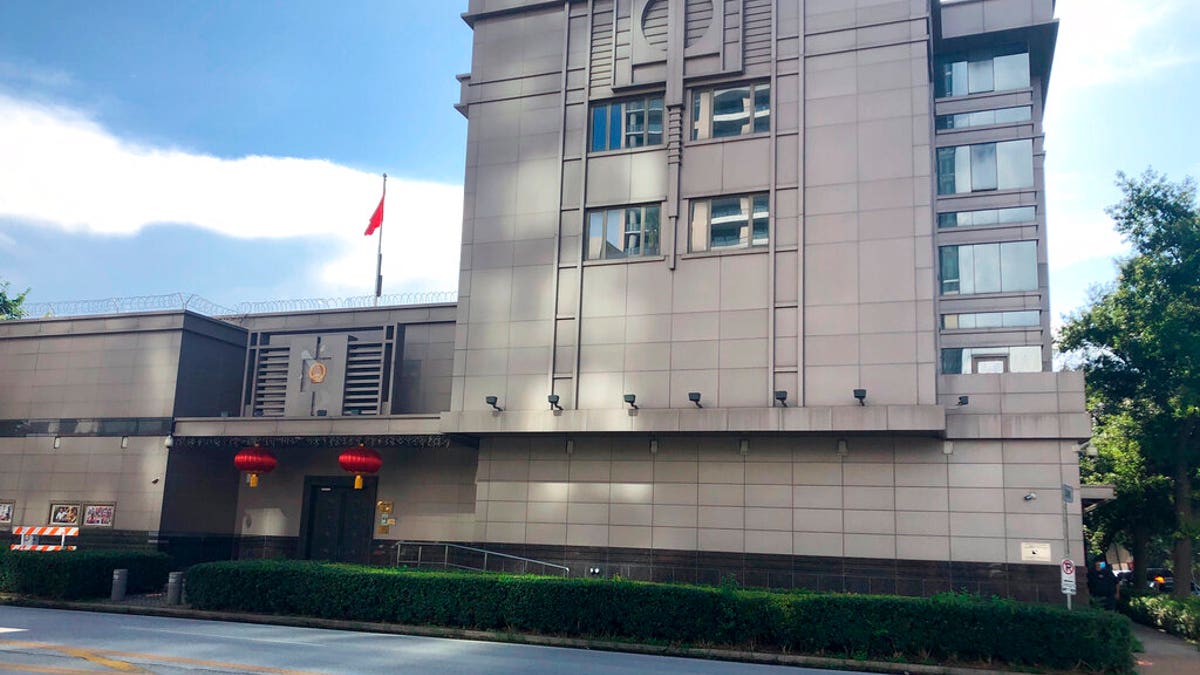 The Chinese Consulate General in Houston. Police and fire officials there responded to reports that documents were being burned in the courtyard of the consulate Tuesday night, according to the Houston Police Department. (AP Photo/John Mone)