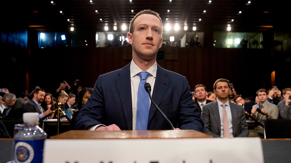 In this April 10, 2018 photo, Facebook CEO Mark Zuckerberg arrives to testify before a joint hearing of the Commerce and Judiciary Committees on Capitol Hill in Washington. (AP Photo/Andrew Harnik)