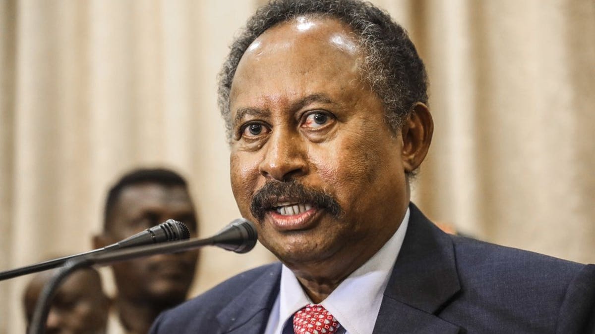 In this Aug. 21, 2019 file photo, Sudan's new Prime Minister Abdalla Hamdok speaks during a press conference in Khartoum, Sudan. Sudan’s transitional government has announced a major Cabinet reshuffle, hoping to defuse public discontent over collapse of the economy and other crises that have tested the country’s path toward democracy. Hamdok on Thursday, July 9, 2020 accepted the resignation of six ministers, including the finance minister who has been faulted for failing to rescue the plunging economy.