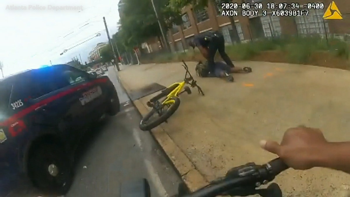 An Atlanta police officer borrowed a person's bicycle while running after a fleeing murder suspect.