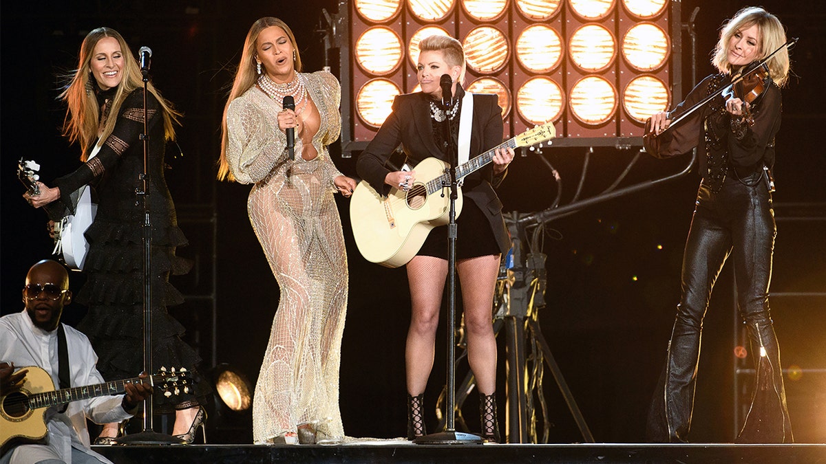 Beyonce and the band formerly known as 'The Dixie Chicks' perform at the 50th Annual CMA Awards on Nov. 2, 2016, at Bridgestone Arena in Nashville, Tenn. (Image Group LA/Walt Disney Television via Getty Images)