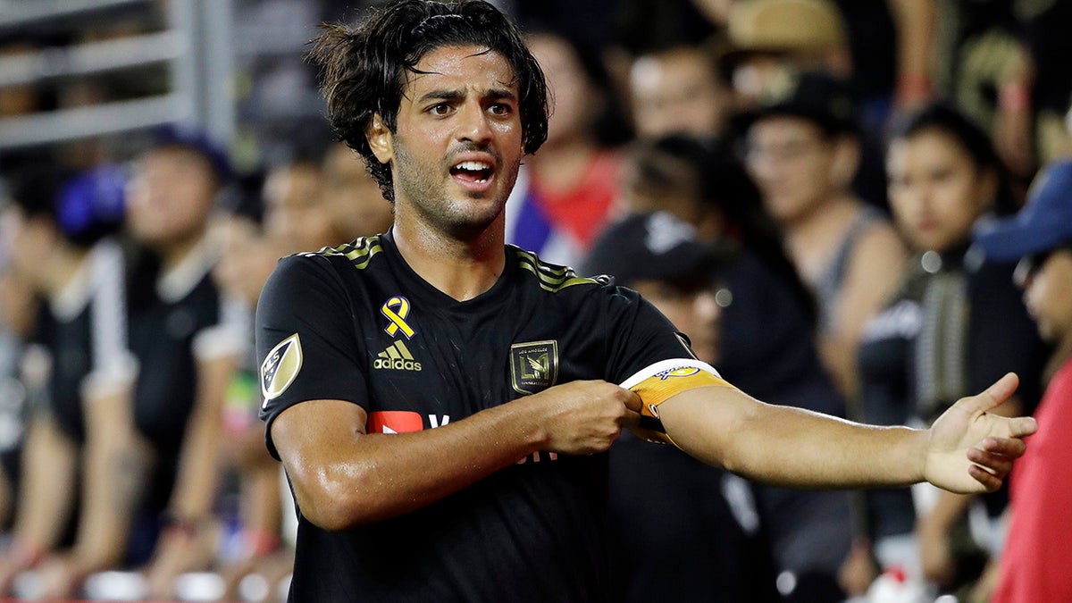 Major League Soccer MVP Carlos Vela will not accompany Los Angeles FC to the league's return tournament in Orlando this month. Vela announced his decision Monday, July 6, 2020, citing his concern for the health of his family, including his pregnant wife.(AP Photo/Marcio Jose Sanchez, File)