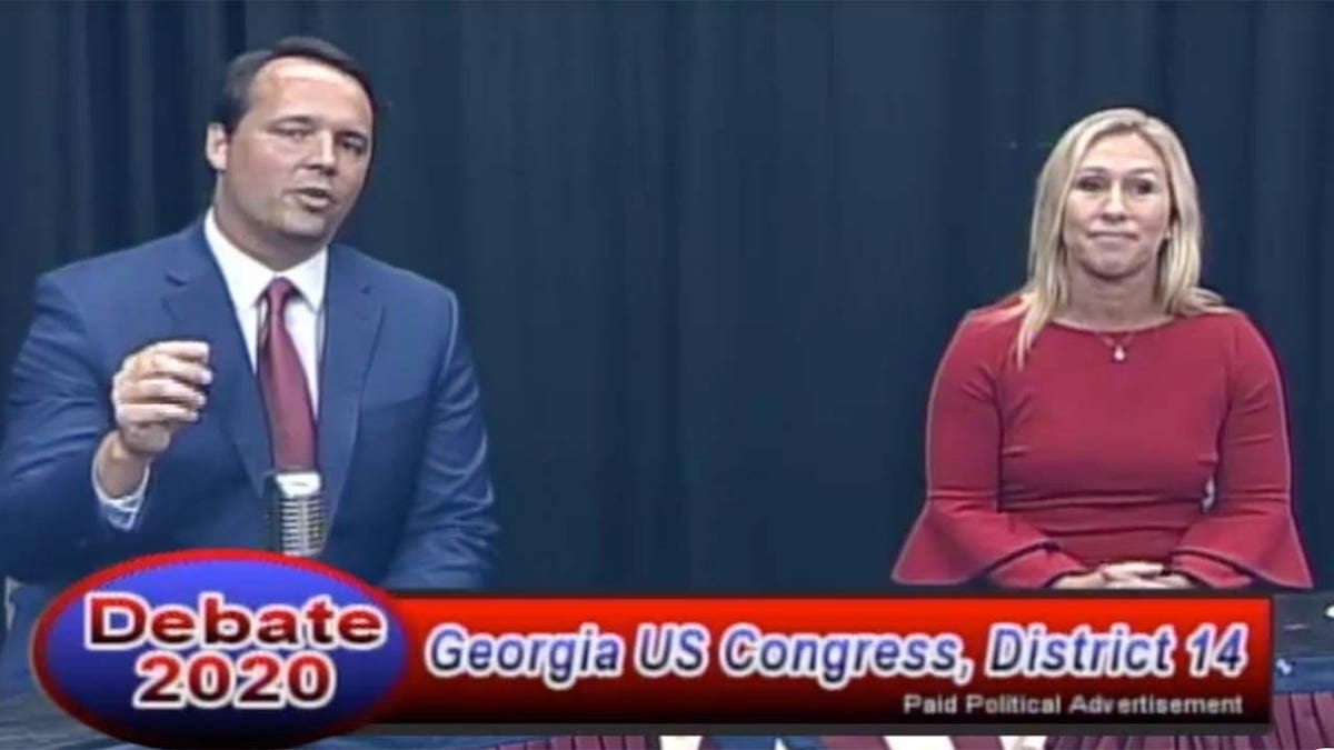 Marjorie Greene (R) and John Cowan (R) debate Wednesday for the 14th Congressional district seat in Georgia.