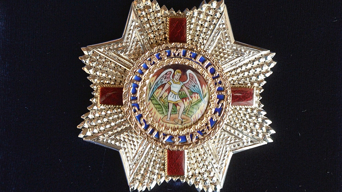 The Insignia of an Honorary Dame Grand Cross of the Most Distinguished Order of St Michael and St George has been criticized for its imager in the wake of the death of George Floyd.