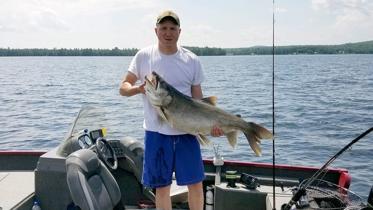 The 34-year-old man from Andover set a new state record with his 39.2-pound lake trout.