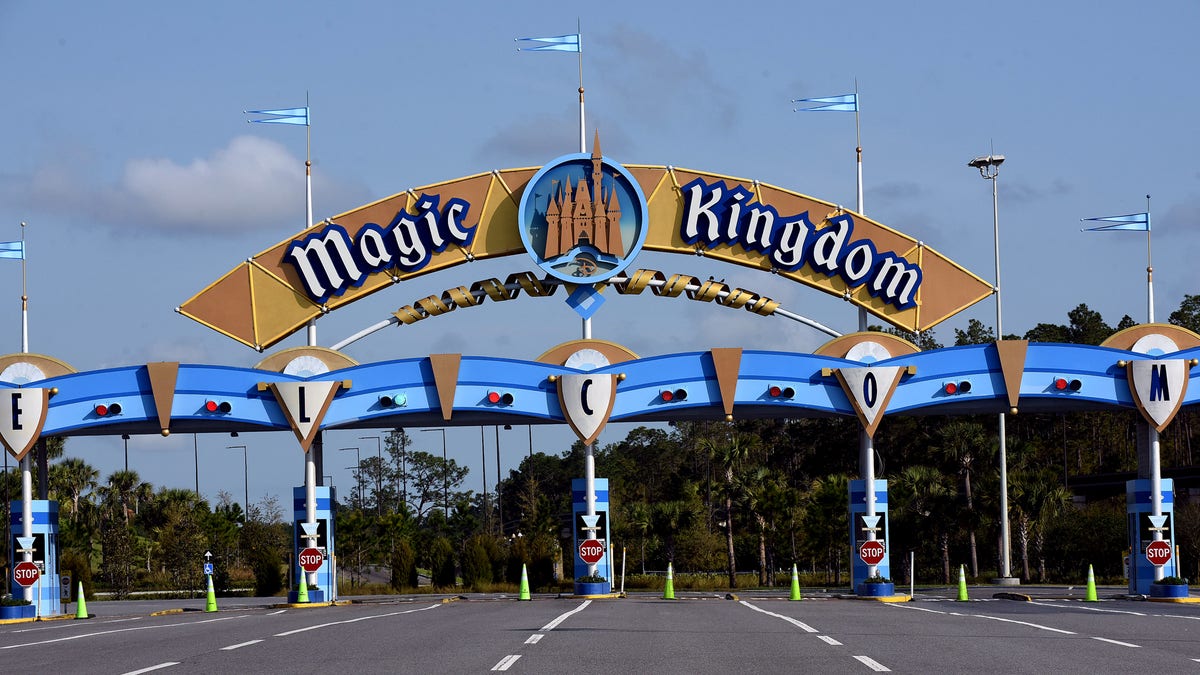 The entrance to the Magic Kingdom at Disney World is seen on the first day of its closure.