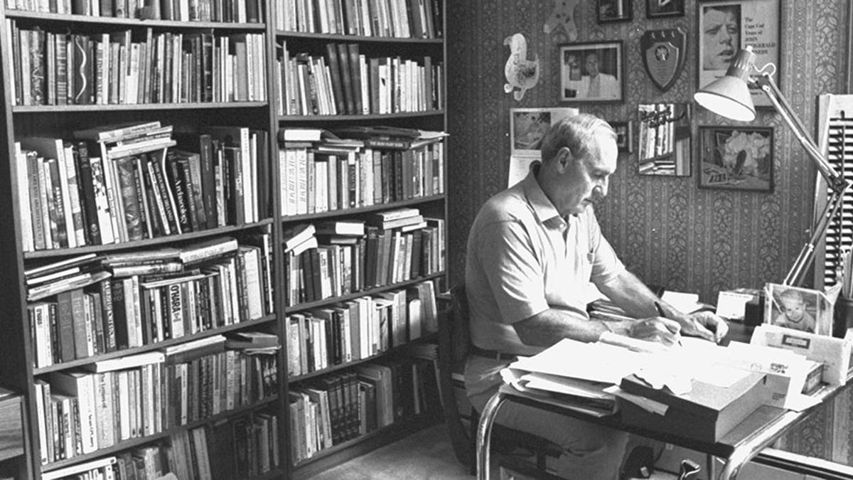 Writer Leo Damore working in his study at home.