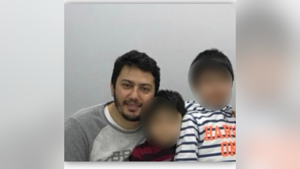 Serkan Golge with his two sons after being released from a Turkish prison