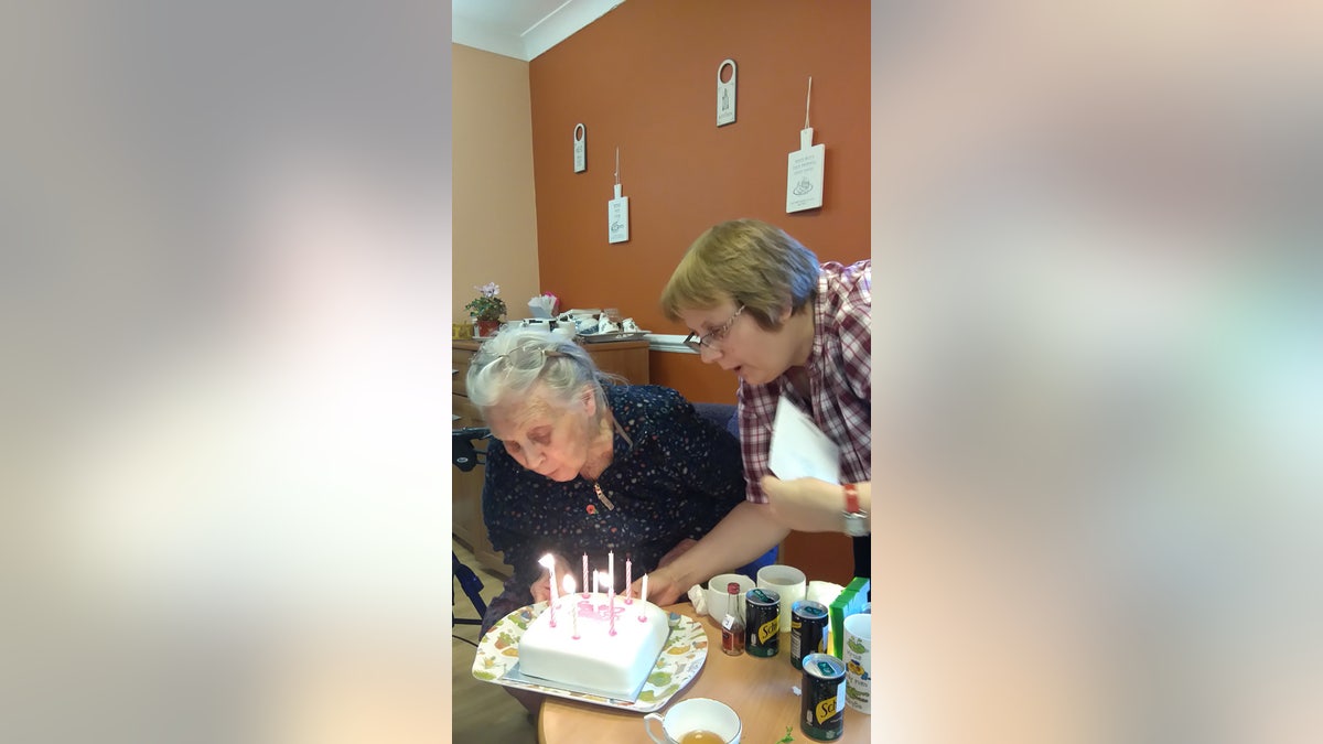 Joy Andrew celebrates her 99th Birthday with daughter Michele.(SWNS)