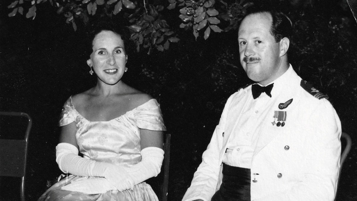 Squadron Leader David Andrew MBE AFC with wife Joy Andrew. (SWNS)