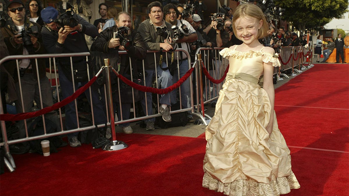 Dakota Fanning during 'Man on Fire' red carpet premiere in Los Angeles.