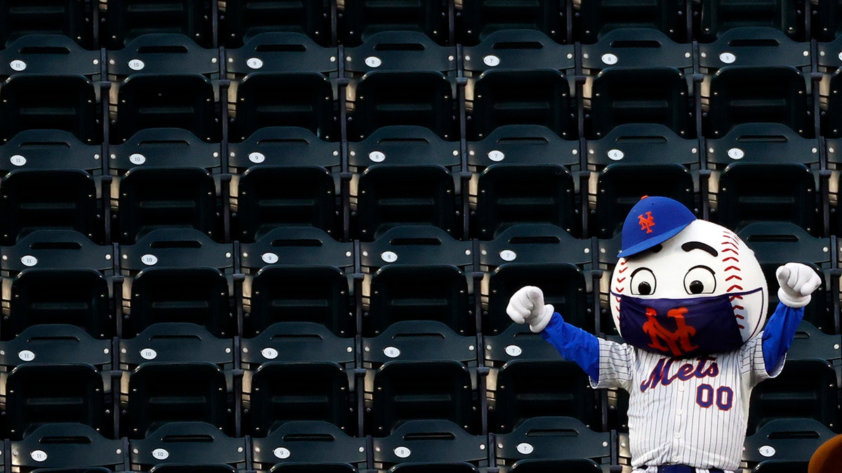 A New York Mets mascot dances in the stands during a break in play in a baseball game between the Atlanta Braves and the Mets on Sunday, July 26, 2020, in New York. (AP Photo/Adam Hunger)