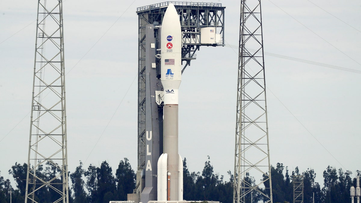 A United Launch Alliance Atlas V rocket that will launch to Mars arrives at Space Launch Complex 41 at the Cape Canaveral Air Force Station, Tuesday, July 28, 2020, in Cape Canaveral, Fla.