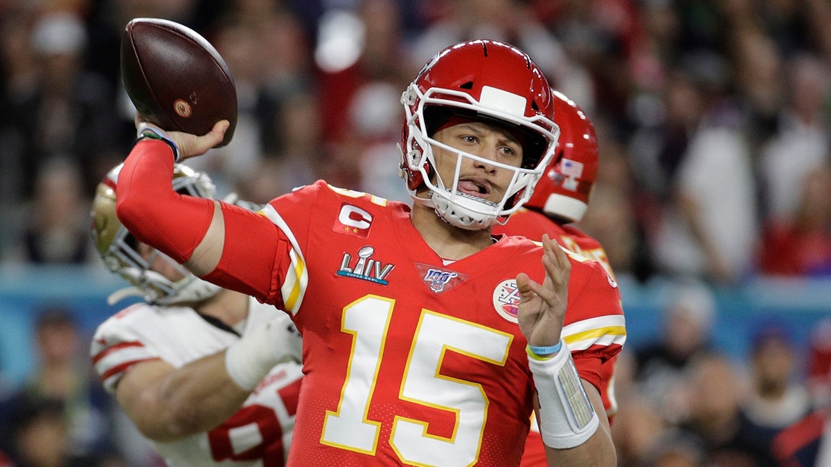 Kansas City Chiefs quarterback Patrick Mahomes (15) passes against the San Francisco 49ers during the first half of the NFL Super Bowl 54 football game in Miami Gardens, Fla., on Feb. 2, 2020. Mahomes agreed to a 10-year extension worth $503 million, according to his agency, Steinberg Sports. <br>
(AP Photo/Patrick Semansky, File)
