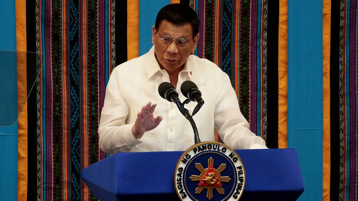 Philippine President Rodrigo Duterte gestures during his fourth State of the Nation Address at the Philippine Congress in Quezon City, Philippines in 2019.  