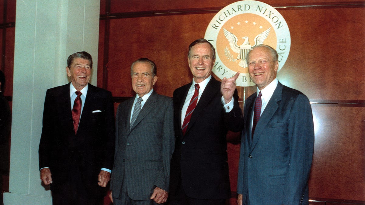 Former U.S. presidents Ronald Reagan, left, Richard Nixon, and Gerarld Ford, far right, pose with U.S. President George Bush, second from right, in the Richard Nixon Library and Birthplace in Yorba Linda, Ca., July 19, 1990. (AP Photo/Barry Thumma)