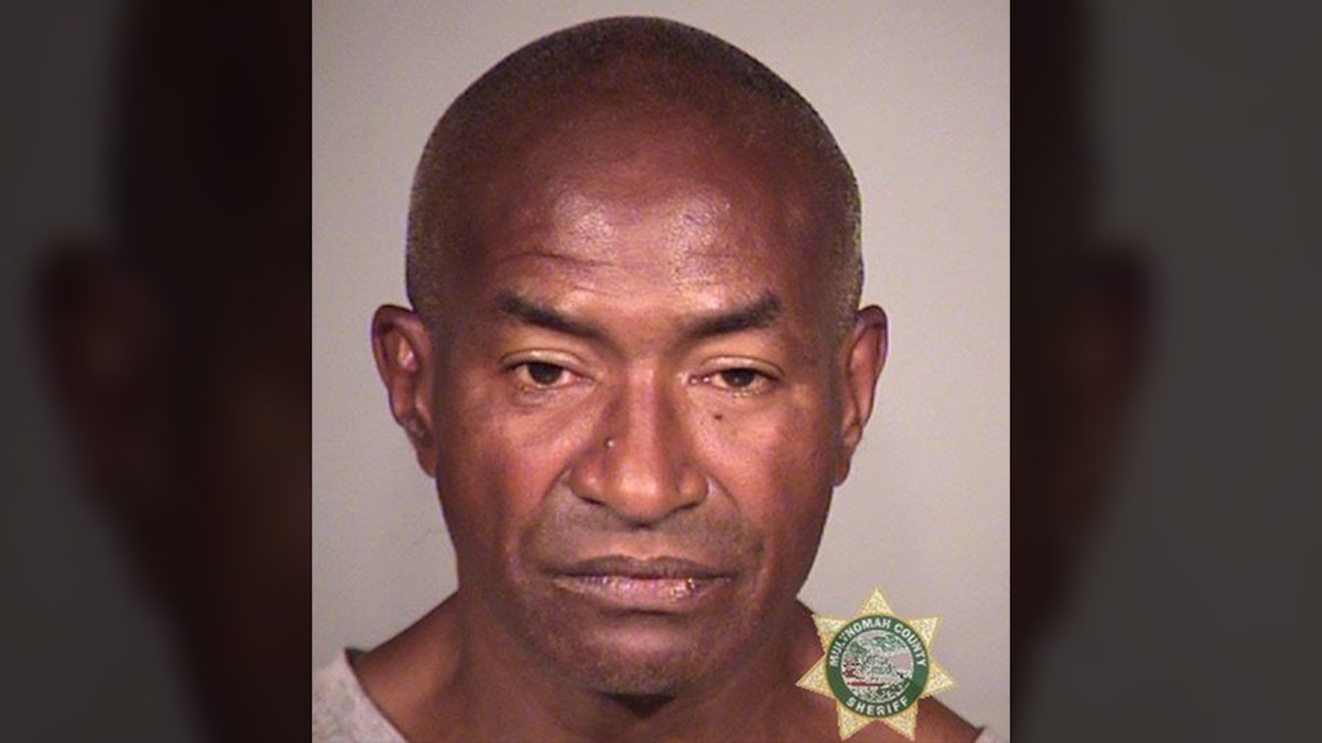 Police got 911 calls that Shane Vordelmicha Green had assaulted people with the handsaw and a belt, broken car windshields and threatened people. (Portland Police)