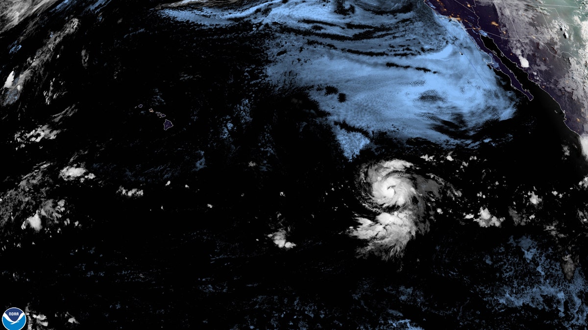 Hurricane Douglas can be seen swirling in the Pacific early July 22.