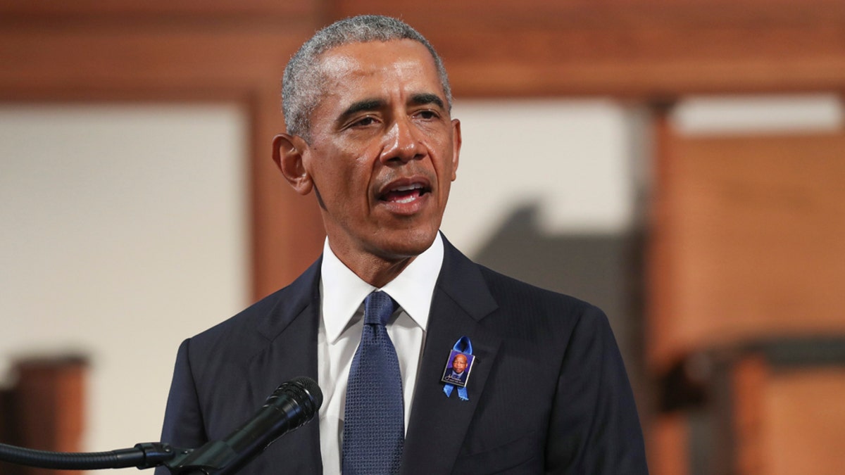 Former President Barack Obama, addresses the service during the funeral for the late Rep. John Lewis, D-Ga., at Ebenezer Baptist Church in Atlanta, Thursday, July 30, 2020. (Alyssa Pointer/Atlanta Journal-Constitution via AP, Pool)