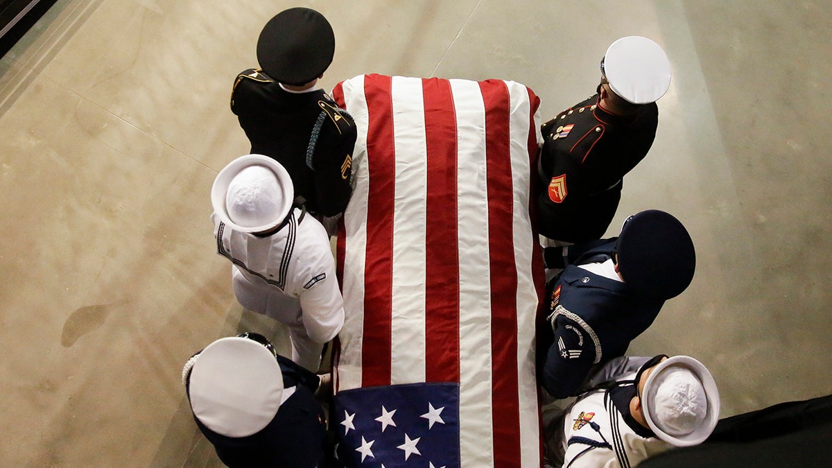 The casket of the late Rep. John Lewis, D-Ga., arrives to lie in repose at Troy University on Saturday, July 25, 2020, in Troy, Ala. (AP Photo/Brynn Anderson)