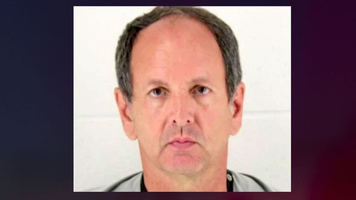 James Loganbill, 58, left his teaching job in March. He now faces a charge of reckless stalking, authorities say. (City of Olathe)
