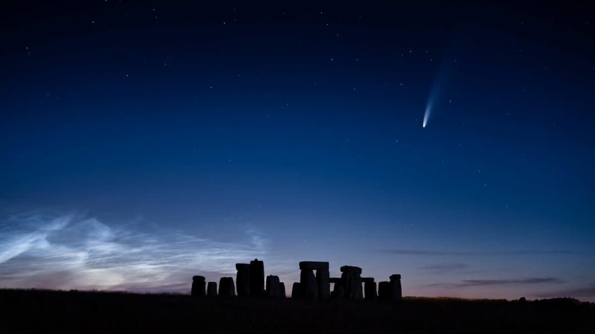 The comet was seen streaking over Stonehenge on a perfect summer's evening. (Credit: SWNS)