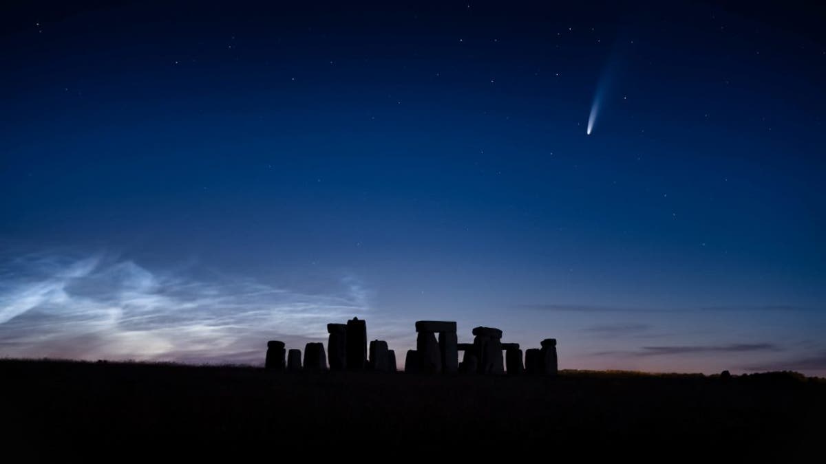 The comet was seen streaking over Stonehenge on a perfect summer's evening. (Credit: SWNS)