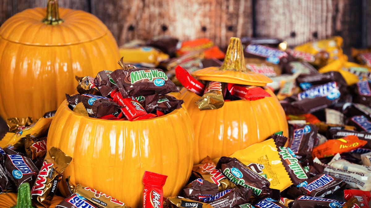 Decorative pumpkins filled with Halloween candy