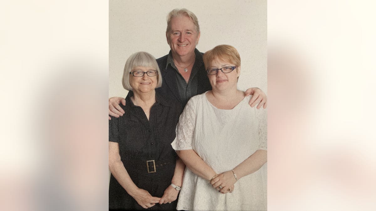 Phil Cunningham with his mum and his sister, Laura Cunningham-Brown.