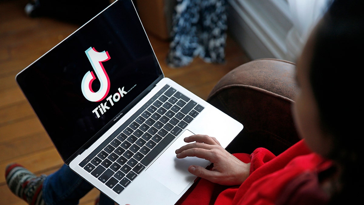 In this photo illustration the logo of Chinese media app for creating and sharing short videos TikTok, also known as Douyin is displayed on the screen of an apple macbook pro computer on November 20, 2019 in Paris, France.