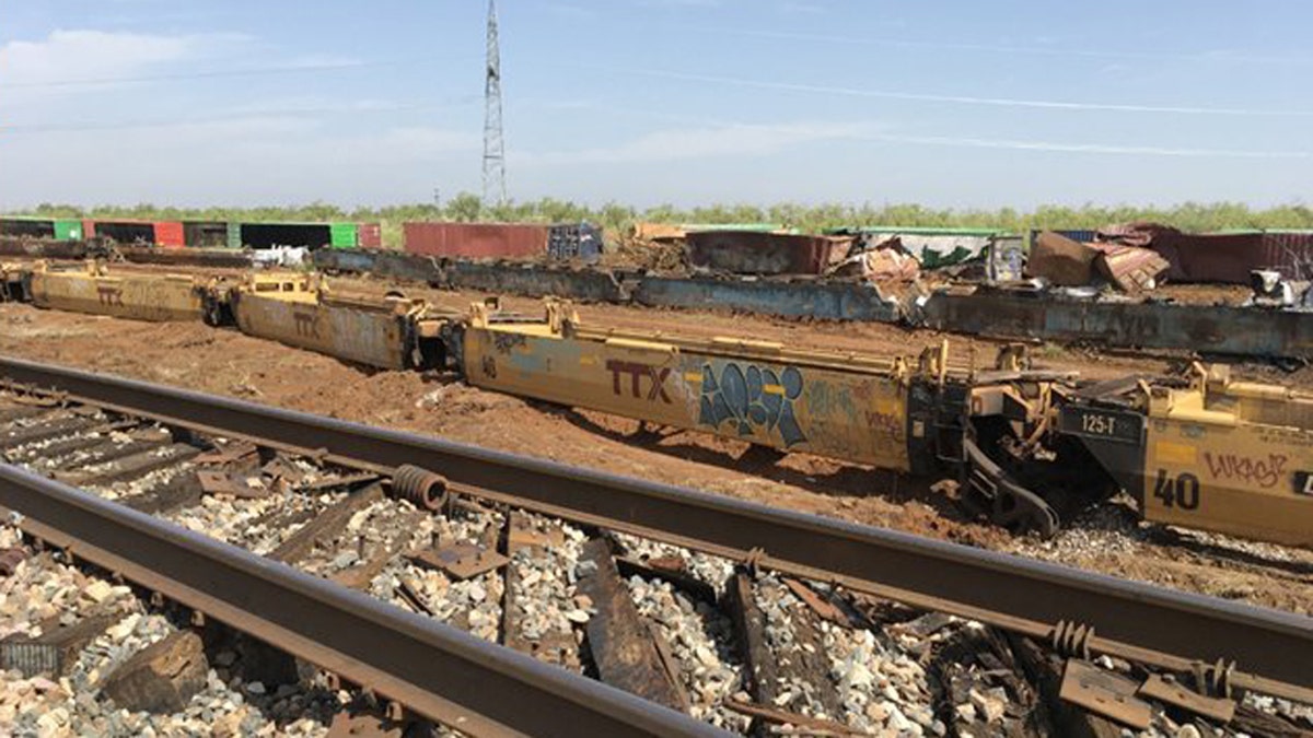 Dozens of train cars derailed after a severe thunderstorm blasted a West Texas community on Tuesday night.