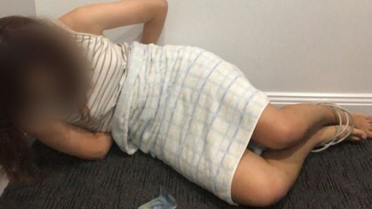 Scammers convince Chinese students to take photos of themselves bound and gagged in order to avoid being deported or arrested. (New South Wales Police)