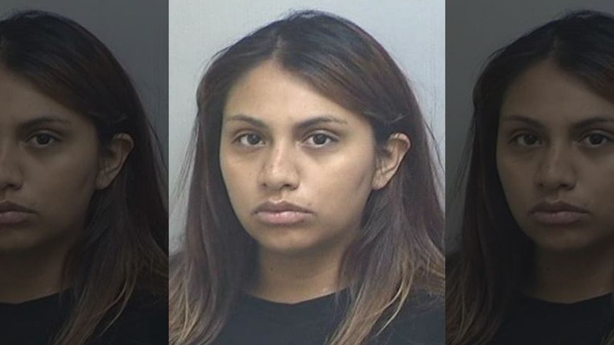 Jacqueline More, 21, of Zion, Ill., is charged in the stabbing death of her boyfriend, authorities say. (Zion Police Department)