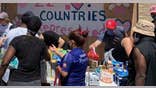 Volunteers give out food and essentials in Minneapolis.