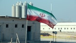 A picture taken on November 10, 2019, shows an Iranian flag in Iran's Bushehr nuclear power plant, during an official ceremony to kick-start works on a second reactor at the facility. - Bushehr is Iran's only nuclear power station and is currently running on imported fuel from Russia that is closely monitored by the UN's International Atomic Energy Agency. (Photo by ATTA KENARE / AFP) (Photo by ATTA KENARE/AFP via Getty Images)