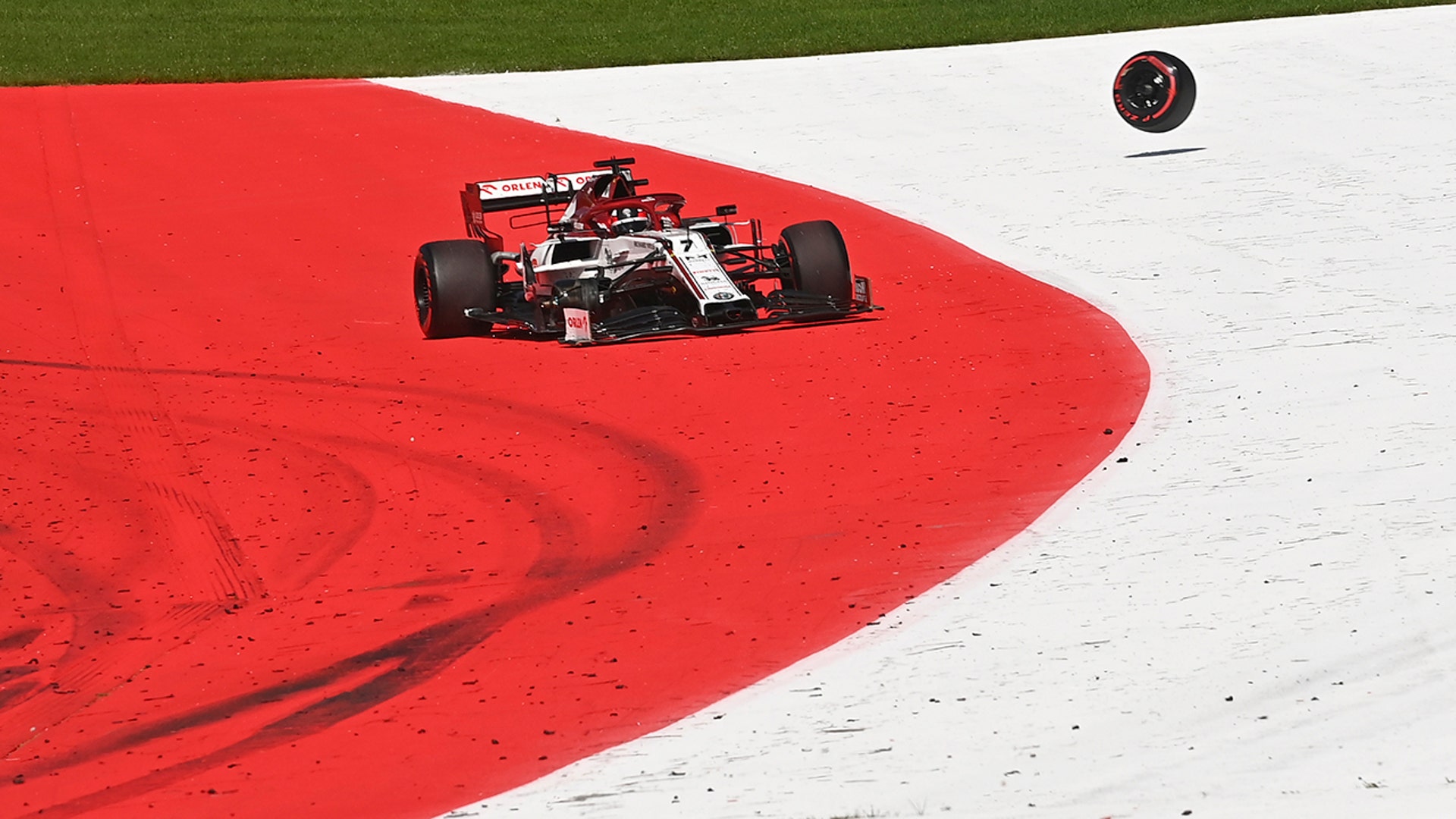 Alfa Romeo driver Kimi Raikkonen of Finland steers his damaged car after crashing during the Austrian Formula One Grand Prix in Spielberg, Austria, July 5, 2020.