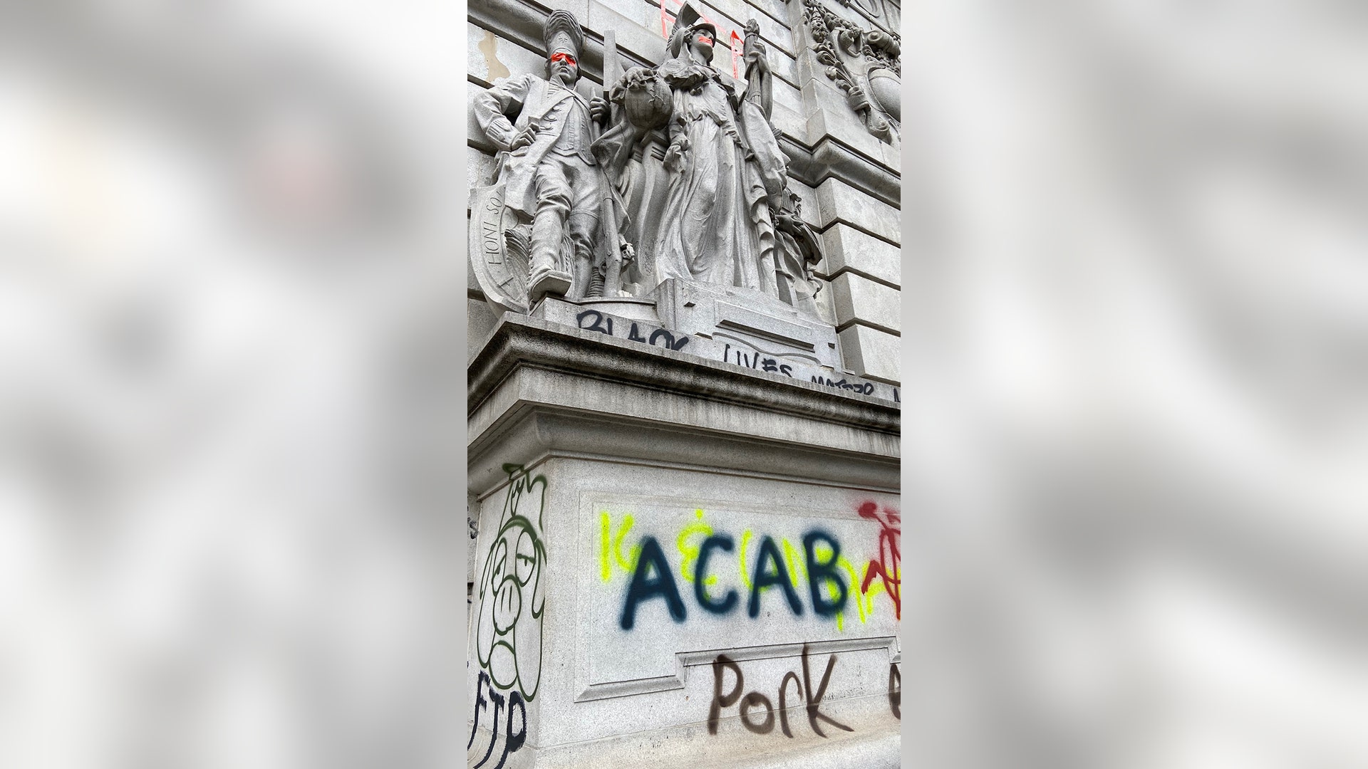 A group of protesters clashed with police in the early morning hours on Wednesday as tensions increased ahead of a City Council vote on New York City’s budget, which included cuts to the police department. In the photo, a graffiti-covered court building at 31 Chambers Street.