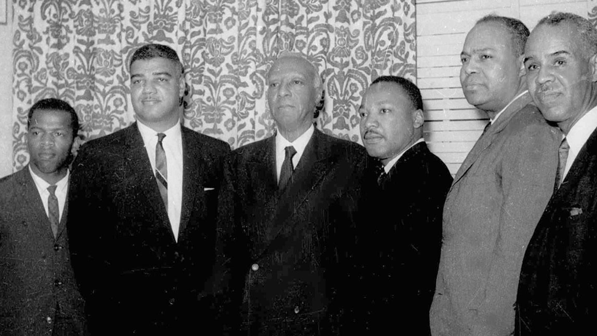Six leaders of the nation's largest black civil rights organizations pose at the Roosevelt Hotel in New York, July 2, 1963. From left, are: John Lewis, chairman Student Non-Violence Coordinating Committee; Whitney Young, national director, Urban League; A. Philip Randolph, president of the Negro American Labor Council; Martin Luther King Jr., president Southern Christian Leadership Conference; James Farmer, Congress of Racial Equality director; and Roy Wilkins, executive secretary, National Association for the Advancement of Colored People.